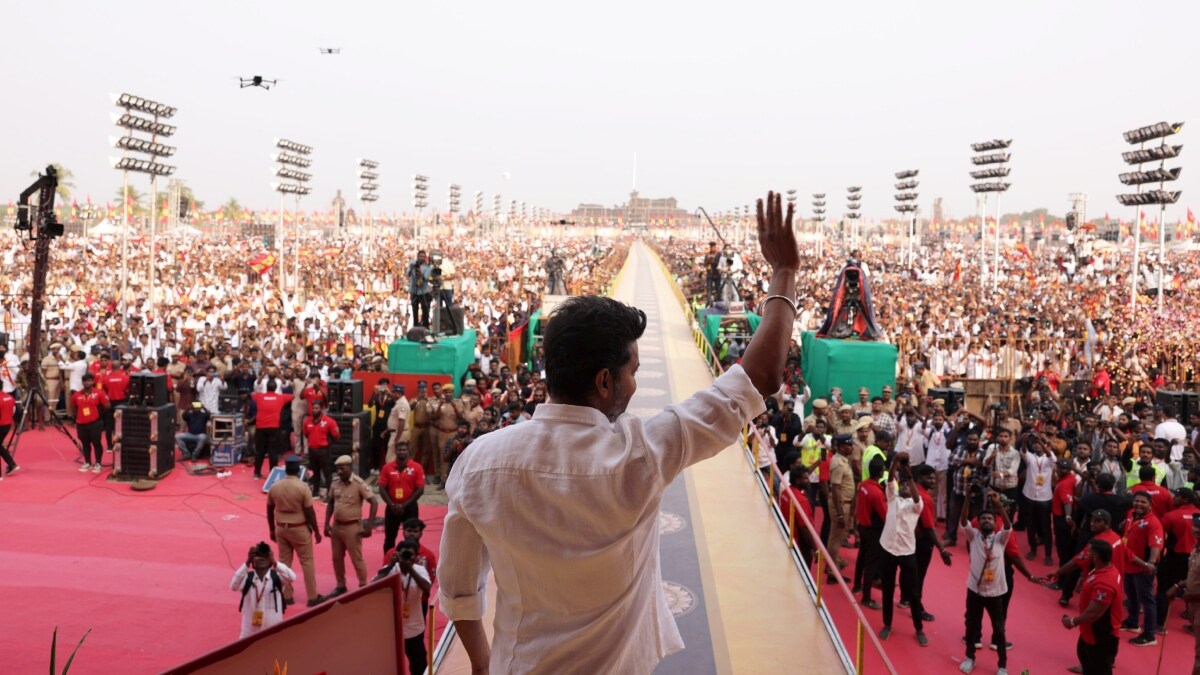 Tamilaga Vetri Kazhagam's Vijay waves at supporters during his pary's first political conference at Vikravandi | PTI