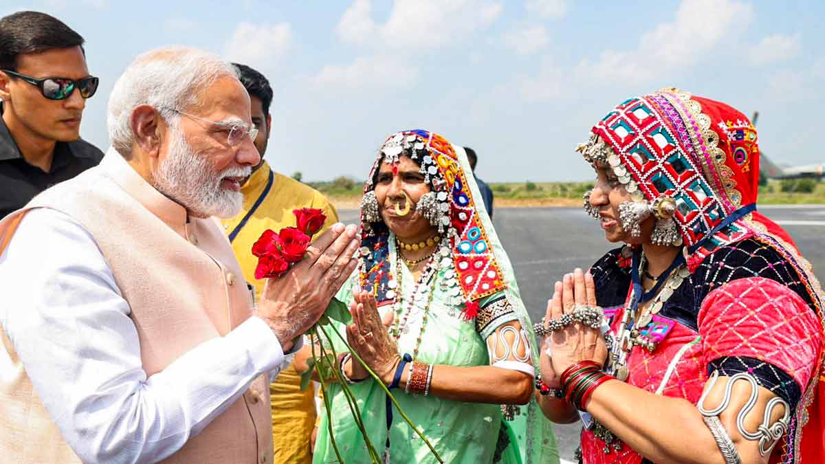 Prime Minister Narendra Modi being welcomed by women from the Banjara community, in Wardha, Maharashtra | PTI