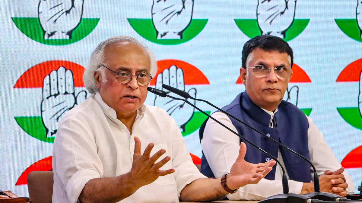 Congress leaders Jairam Ramesh and Pawan Khera address a press conference at AICC headquarters, in New Delhi | PTI