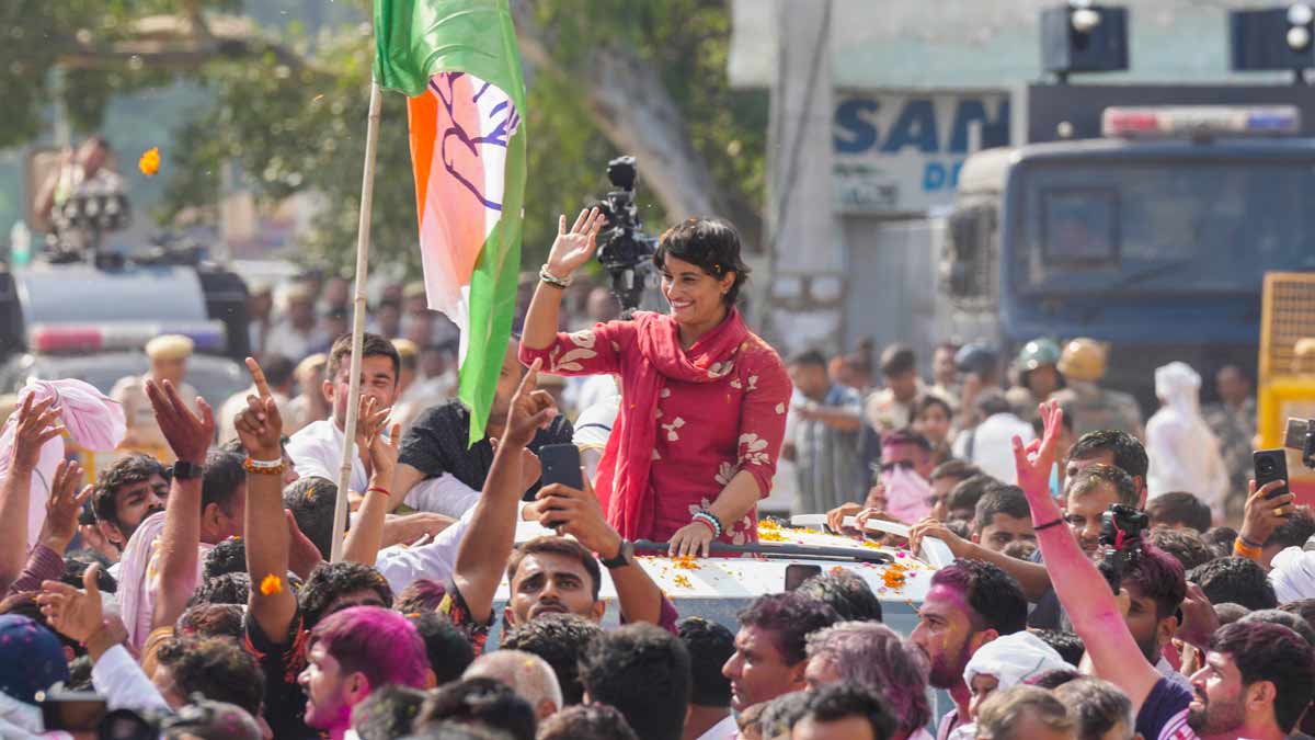 Congress candidate Vinesh Phogat celebrates with supporters after her victory from Julana constituency in the Haryana assembly elections, in Jind | PTI