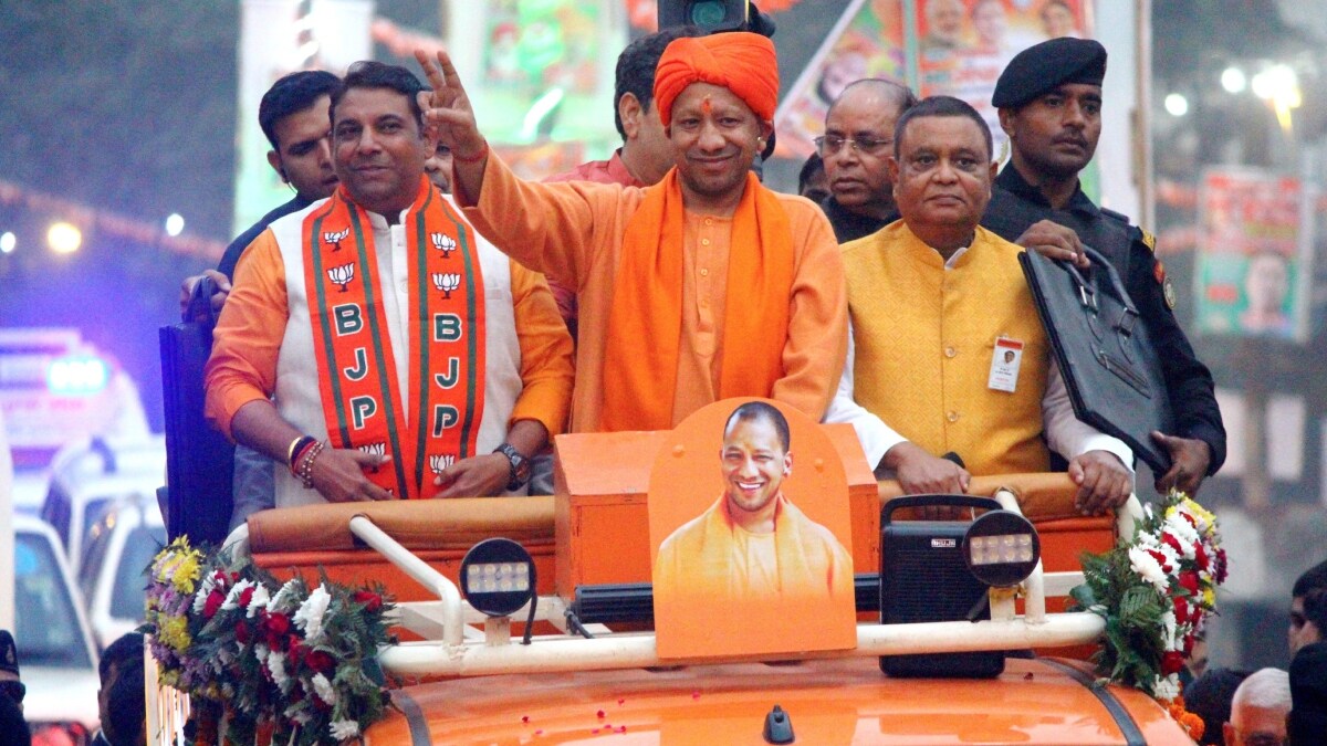 Uttar Pradesh Chief Minister Yogi Adityanath during a roadshow in support of BJP candidate Sanjeev Sharma ahead of the Ghaziabad Assembly constituency bypoll | PTI