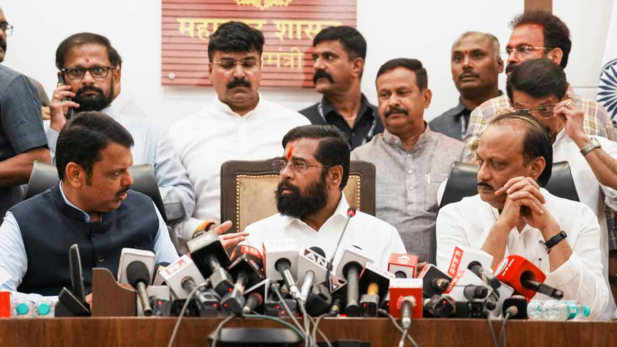 Eknath Shinde with Devendra Fadnavis and Ajit Pawar during a press conference | PTI
