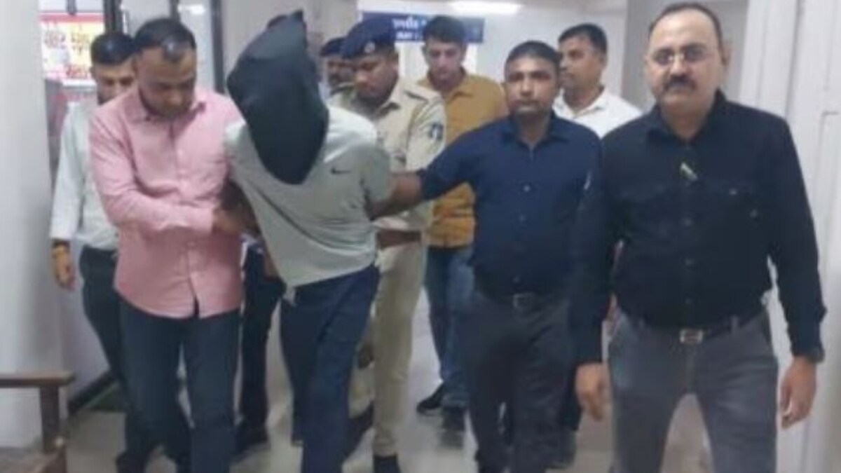 Rahul Jat being brought for interrogation by the Gujarat police | X 