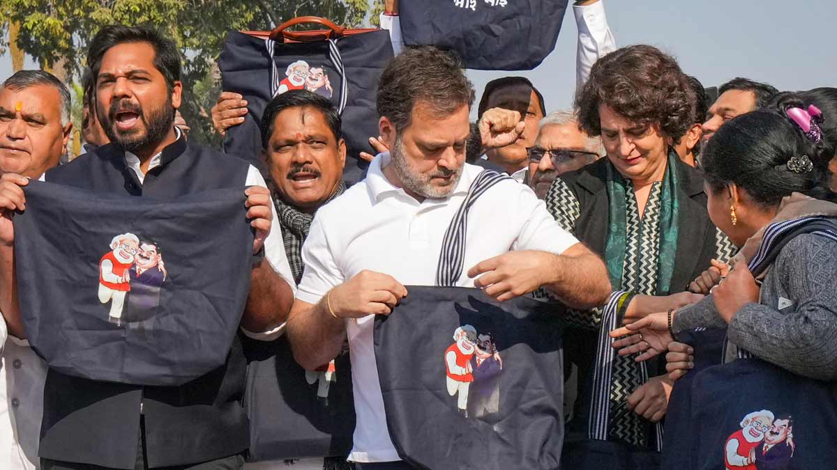 Congress MP Rahul Gandhi with party MP Priyanka Gandhi Vadra and other INDIA bloc MPs stages a protest over indictment of industrialist Gautam Adani by a US court in a bribery case, during the Winter session of Parliament | PTI