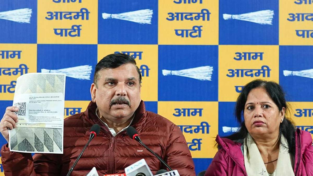 AAP MP Sanjay Singh with his wife Anita Singh addresses a press conference | PTI