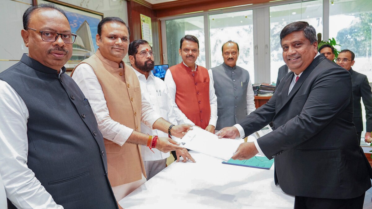 **EDS: IMAGE VIA @Dev_Fadnavis POSTED ON DEC. 8, 2024** Mumbai: Maharashtra Chief Minister Devendra Fadnavis, Deputy Chief Ministers Ajit Pawar and Eknath Shinde and BJP Maharashtra President Chandrashekhar Bawankule during the nomination filing of party MLA Rahul Narwekar as Speaker of the Maharashtra Legislative Assembly, at Vidhan Bhavan, in Mumbai. (PTI Photo) (PTI12_08_2024_000128B)
