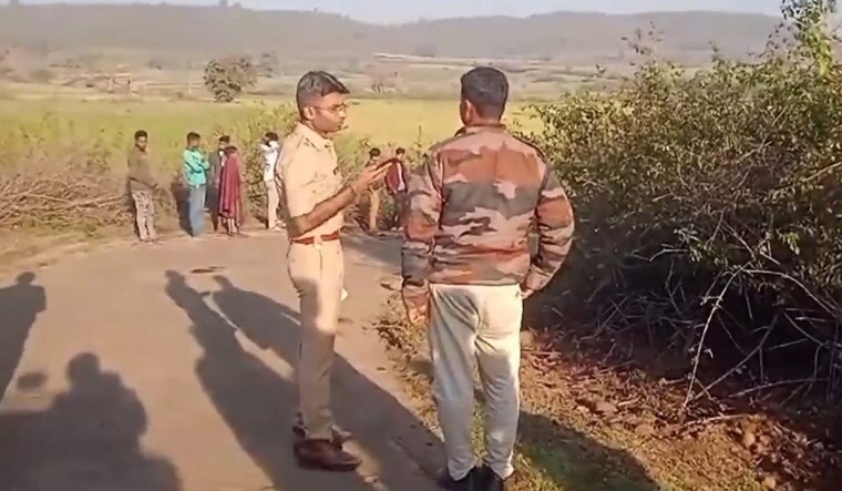 **EDS: SCREENSHOT VIA PTI VIDEO** Dindori: Police personnel near the site of an accident in which 14 people were killed and 20 others injured when a pick-up vehicle overturned, in Dindori district in the wee hours of Thursday, Feb. 29, 2024. (PTI Photo)