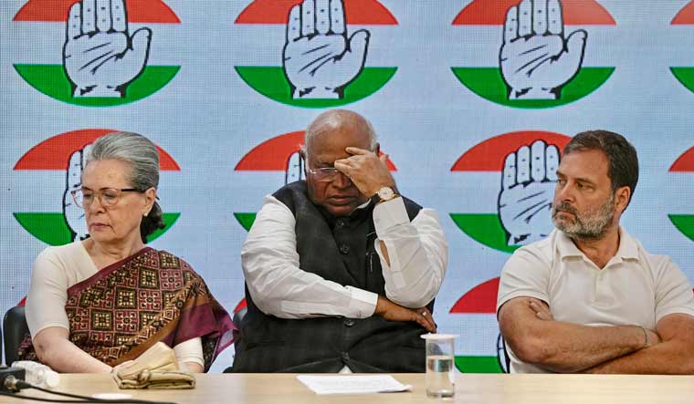 Congress party president Mallikarjun Kharge flanked by senior party leaders Sonia Gandhi and Rahul Gandhi during the press meet held at party headquarters in New Delhi | PTI 
