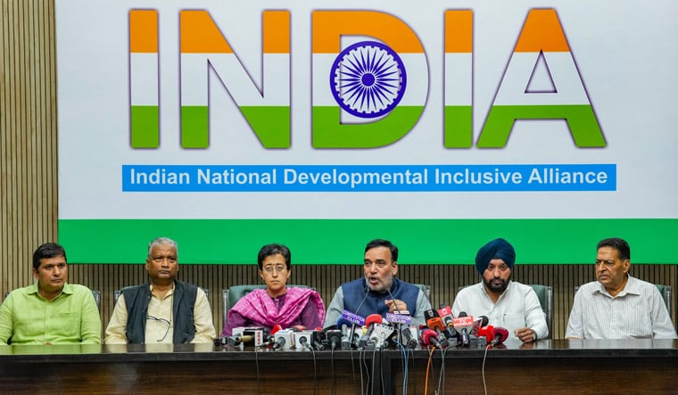New Delhi: Delhi Ministers and AAP leaders Atishi Singh, Gopal Rai and Saurabh Bharadwaj with Delhi Congress President Arvinder Singh Lovely and others during a press conference of Indian National Developmental Inclusive Alliance (INDIA) leaders, in New Delhi, Sunday, March 24, 2024. (PTI Photo/Kamal Singh)(PTI03_24_2024_000067B)