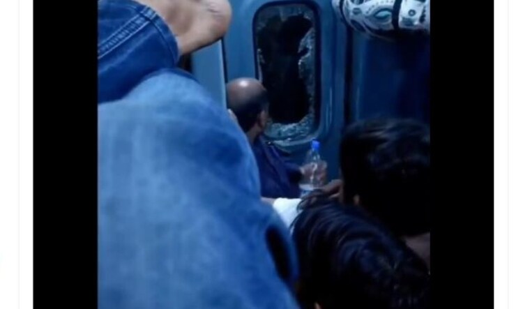 The angry passenger broke the glass after he was locked out by people inside the coach | Twitter