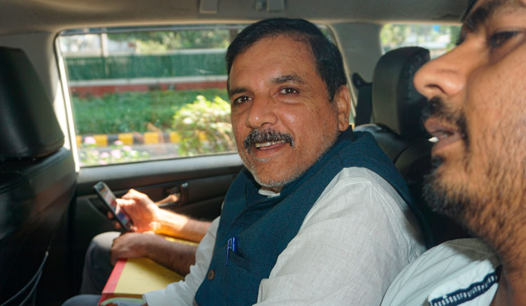 AAP MP Sanjay Singh being taken to the Rouse Avenue Court by the Enforcement Directorate (ED) officials | PTI