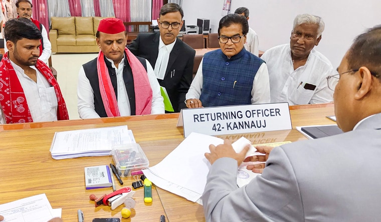 **EDS: HANDOUT IMAGE** Kannauj: Samajwadi Party (SP) chief and former Uttar Pradesh chief minister Akhilesh Yadav files his nomination for Lok Sabha elections, in Kannauj, Thursday, April 25, 2024. Party leader Ram Gopal Yadav is also seen. (PTI Photo)(PTI04_25_2024_000062B)