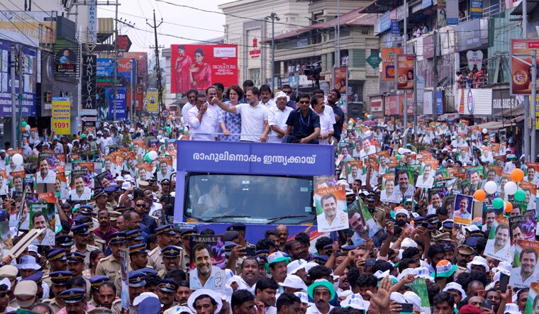 India’s opposition Congress party leader Rahul Gandhi, center in white, accompanied by his sister Priyanka Vadra, in white and blue, arrives to file his nomination papers to contest as a lawmaker from the Wayanad parliamentary constituency in Kalpetta, Kerala state, India, Wednesday, April 3, 2024. India's 6-week-long general election starts on April 19 and results will be announced on June 4. (AP Photo/Rohith. T)
