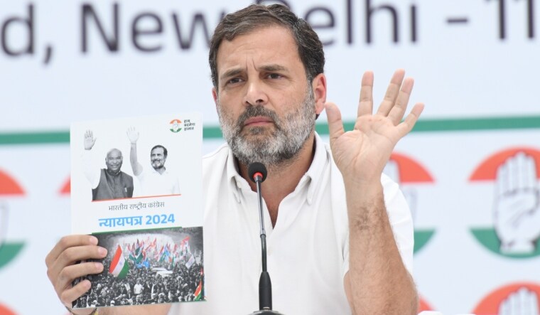 Rahul Gandhi with the Congress manifesto | Sanjay Ahlawat