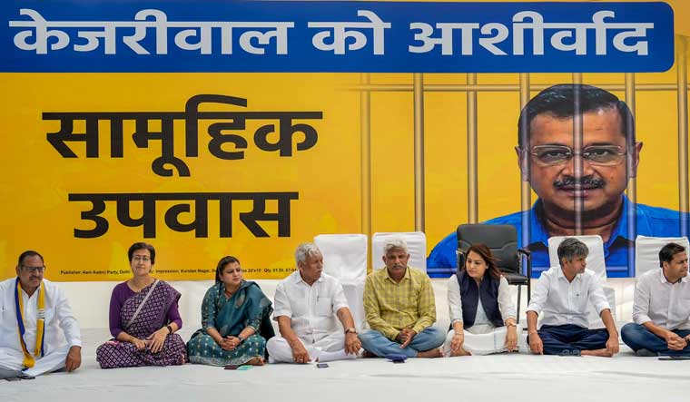 AAP leaders during a day-long mass fast to protest against the arrest of Delhi Chief Minister Arvind Kejriwal at Jantar Mantar | PTI