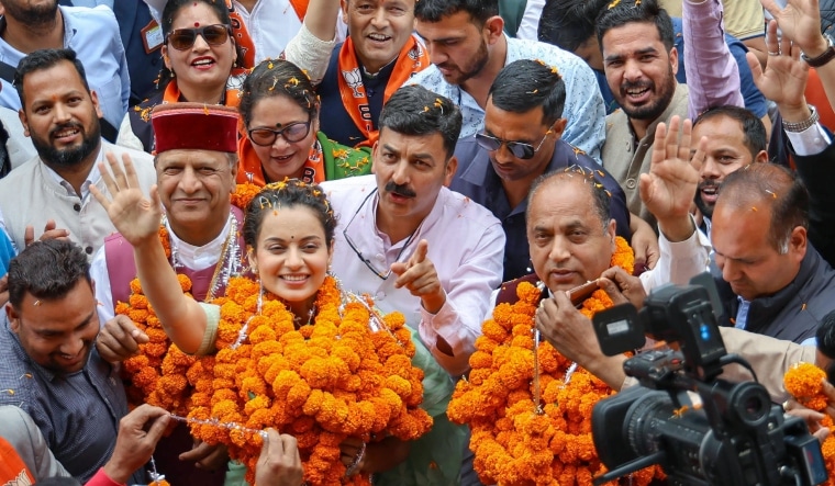 BJP candidate Kangana Ranaut and former CM Jai Ram Thakur during a party meeting, in Mandi | PTI