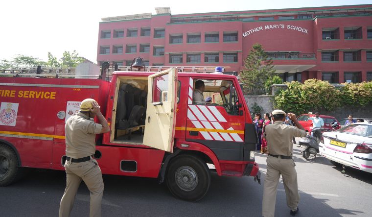 Police and fire department personnel outside Mother Mary's School at Mayur Vihar after multiple schools received a bomb threat, in New Delhi, Wednesday, May 1, 2024 | PTI