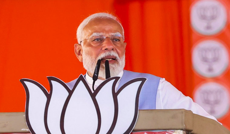 Prime Minister Narendra Modi addresses a public meeting for the Lok Sabha elections, in Hamirpur | PTI