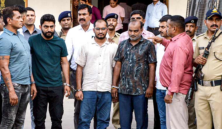 Three accused in the gaming zone fire case being produced before the Rajkot court, Monday | PTI 