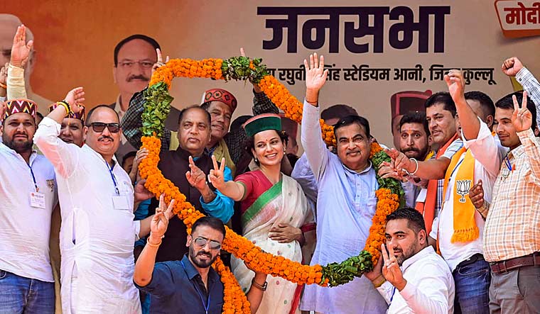 Union Minister Nitin Gadkari with former Himachal Pradesh chief minister Jai Ram Thakur and BJP candidate from Mandi constituency Kangana Ranaut during a public meeting in Kullu | PTI
