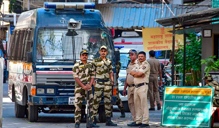 Mumbai Police personnel stand guard outside GT Hospital where one of the accused, who allegedly opened fire outside Bollywood actor Salman Khan's residence, was brought after he attempted suicide in lock-up | PTI