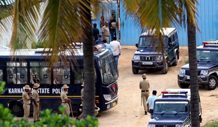 Bengaluru: Police vehicles parked near the crime scene of the Renukaswamy murder case, at Pattanagere in Bengaluru, Wednesday, June 12, 2024. Darshan Thoogudeepa, an accused in the case, was on Wednesday brought to the crime scene for investigation. (PTI Photo)(PTI06_12_2024_000336B)