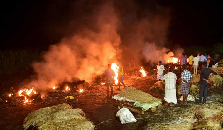 Bodies of people who died after consuming toxic liquor are cremated in Kallakurichi, in Tamil Nadu | Reuters