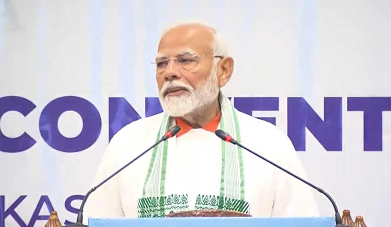  Prime Minister Narendra Modi addresses the gathering on the occasion of the 10th International Day of Yoga, in Srinagar | PTI