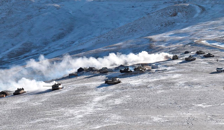 FILE - In this file photo provided by the Indian Army, tanks pull back from the banks of Pangong Tso lake region, in Ladakh along the India-China border on Feb. 10, 2021. Five Indian soldiers were killed when a military tank they were travelling in sank while crossing a river in the remote region of Ladakh that borders China, Defense Minister Rajnath Singh said Saturday, June 29, 2024.  (Indian Army via AP, File)