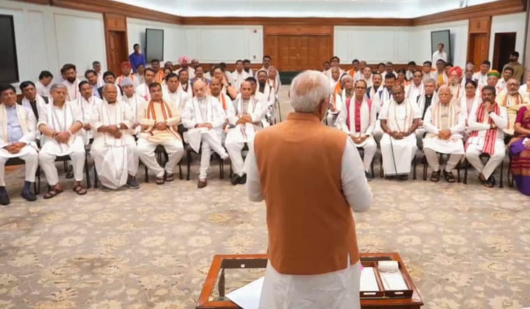 **EDS: VIDEO GRAB** New Delhi: Prime Minister-designate Narendra Modi with NDA leaders during an interaction over tea, in New Delhi, Sunday, June 9, 2024. (PTI Photo)(PTI06_09_2024_000133B)