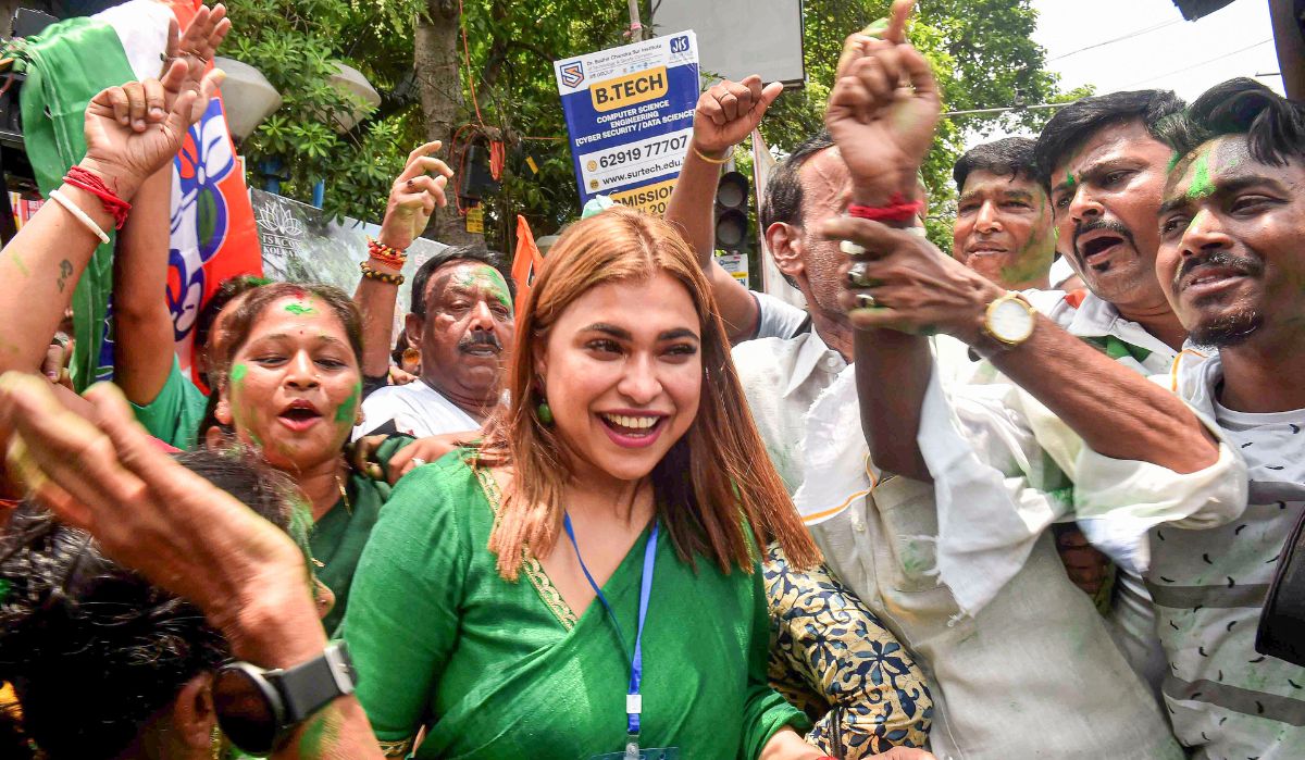 TMC supporters celebrate with Shreya Pandey, daughter of party candidate Supti Pandey, as she leads from Maniktala constituency during counting of votes for Assembly by-election, in Kolkata, Saturday | PTI