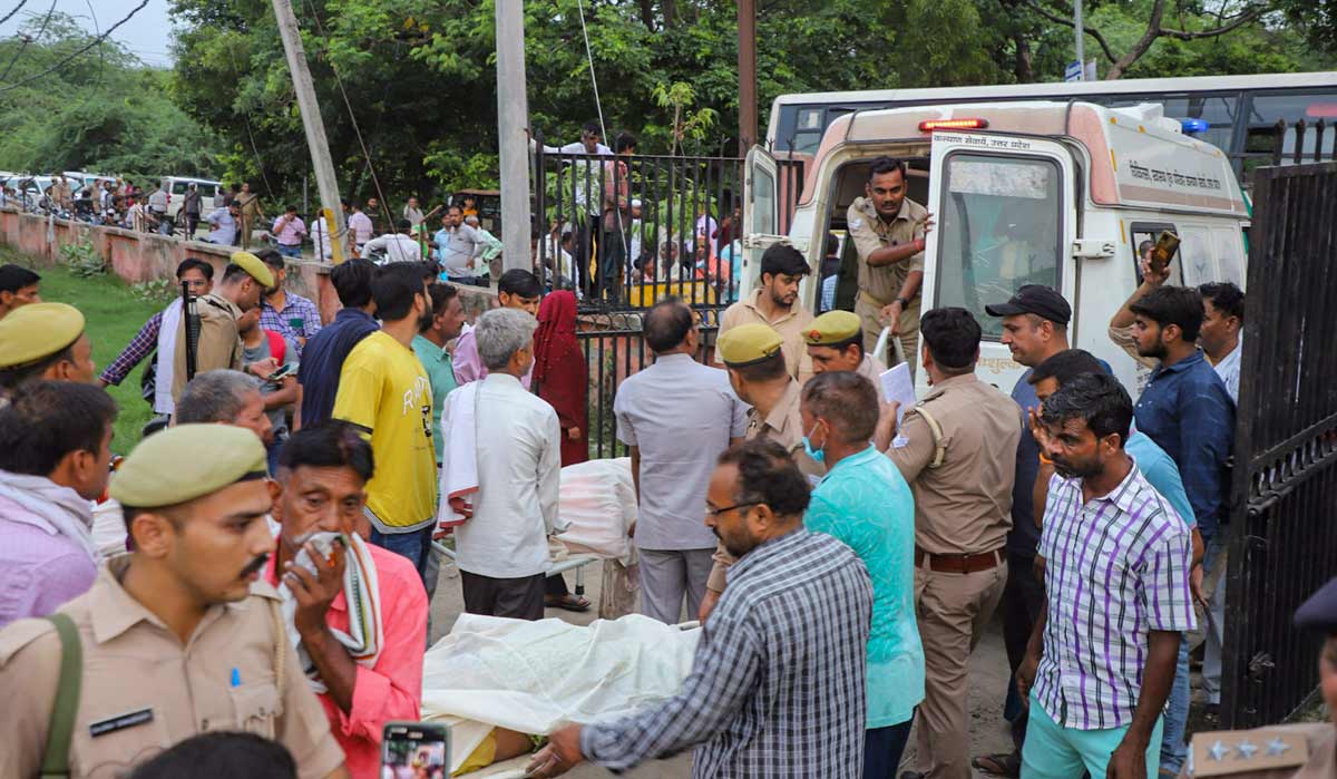 Victims's bodies of the Hathras' stampede being carried, at Sikandra Rao in Hathras, Tuesday | PTI