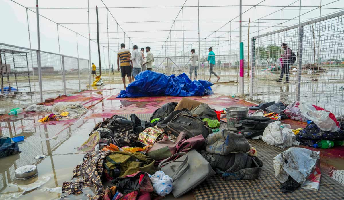 Bags and other belongings lying at the scene a day after a massive stampede in Sikandara Rao area of Hathras | PTI