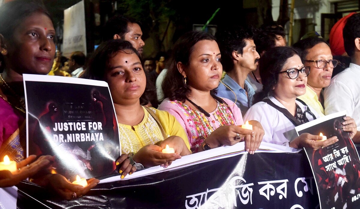 A candlelight march held for the victim of the RG Kar Medical College and Hospital murder case in Kolkata | PTI