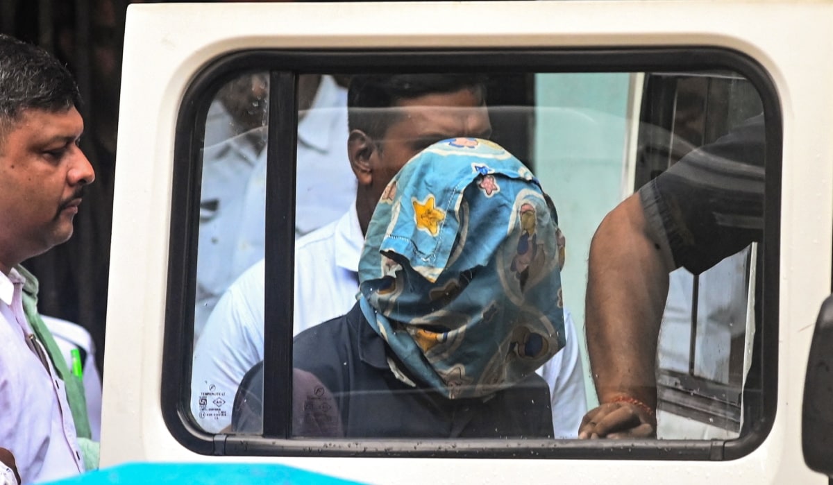 Police personnel produce the accused arrested in connection with the alleged rape and murder of a doctor at RG Kar Medical College and Hospital  before the court | PTI