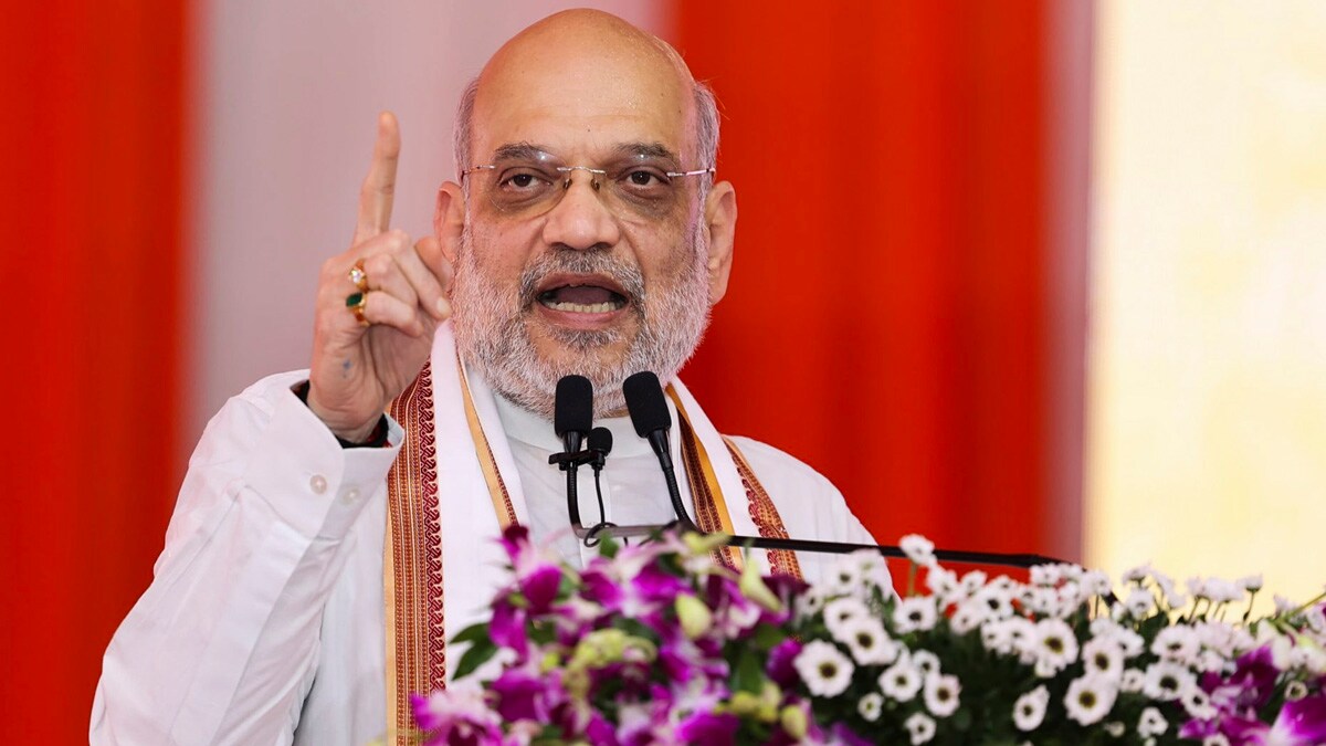**EDS: IMAGE VIA @Bhupendrapbjp** Ahmedabad: Union Home Minister Amit Shah speaks during the inauguration of various developmental projects, in Ahmedabad, Sunday, Aug. 18, 2024. (PTI Photo) (PTI08_18_2024_000057A)