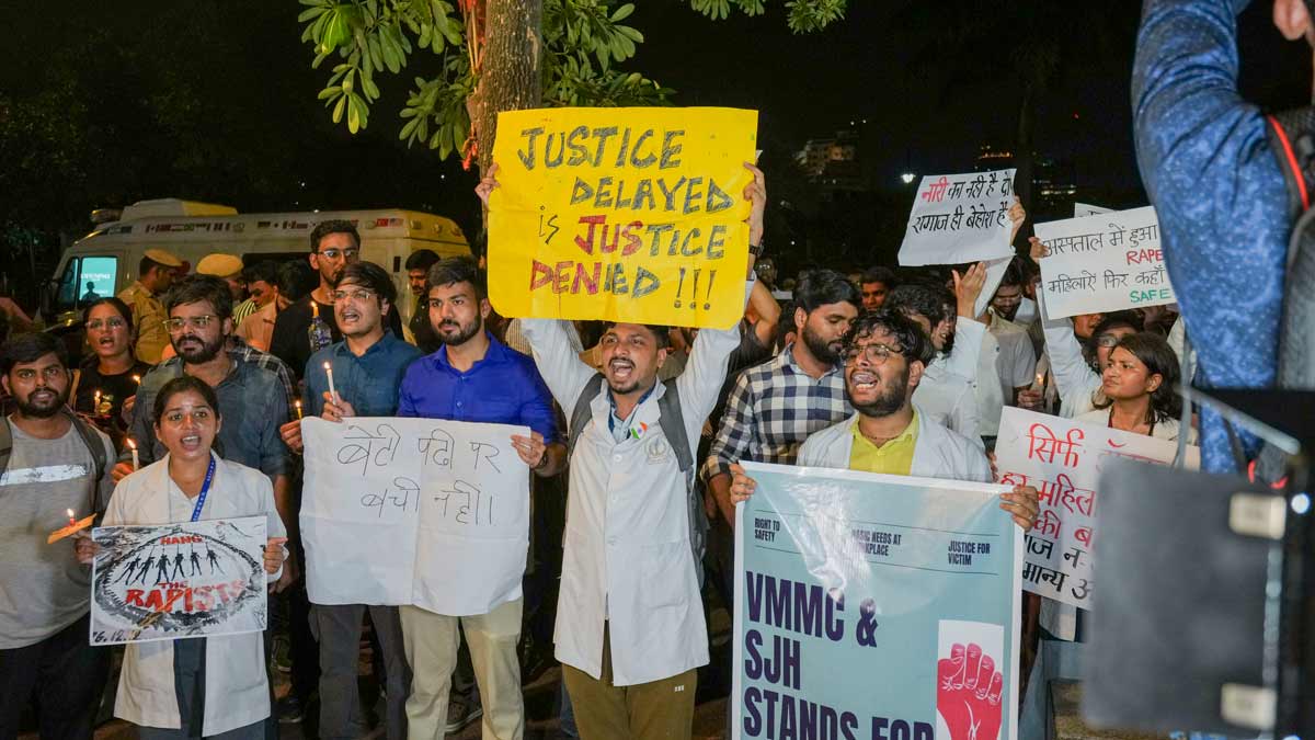  Members of various Resident Doctors Associations protest during a candle march against the alleged rape and murder of a woman doctor at Kolkatas RG Kar Medical College and Hospital | PTI