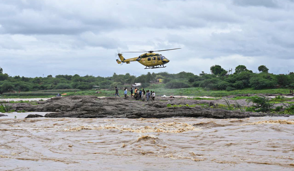 Army Aviators of Thar Raptors conduct a rescue operation to save stranded fishermen from the Girna river in a flood-affected area in Maharashtra | PTI