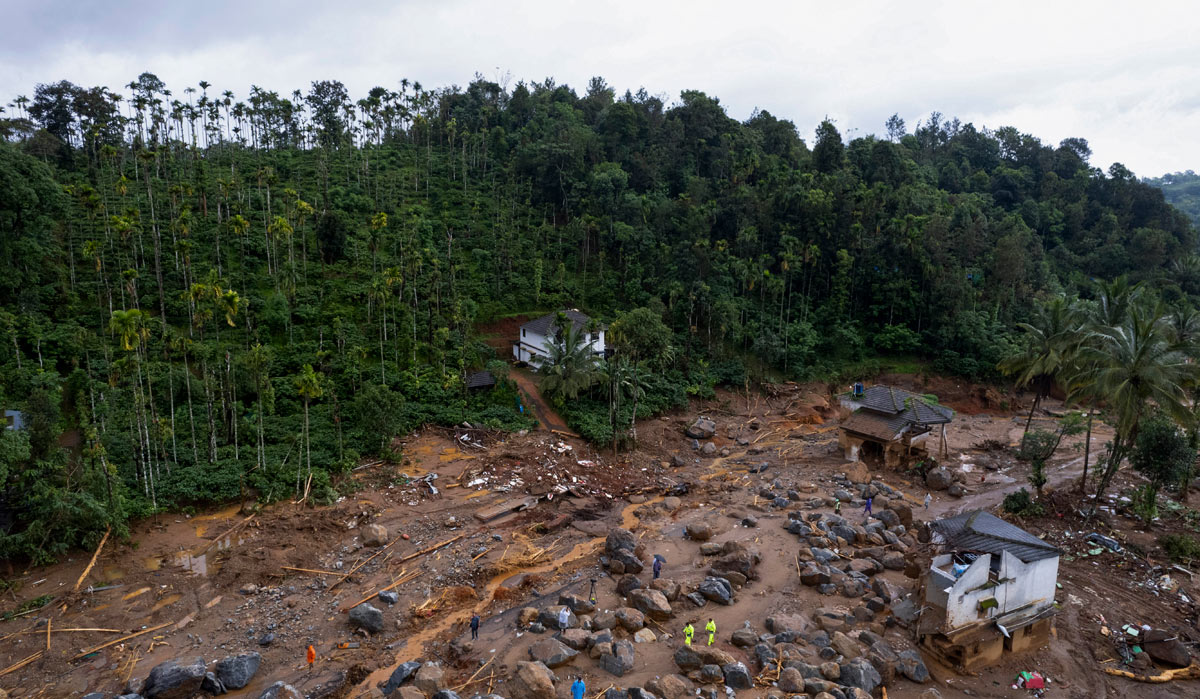 Rescuers search through mud and debris after landslides in Wayanad | AP