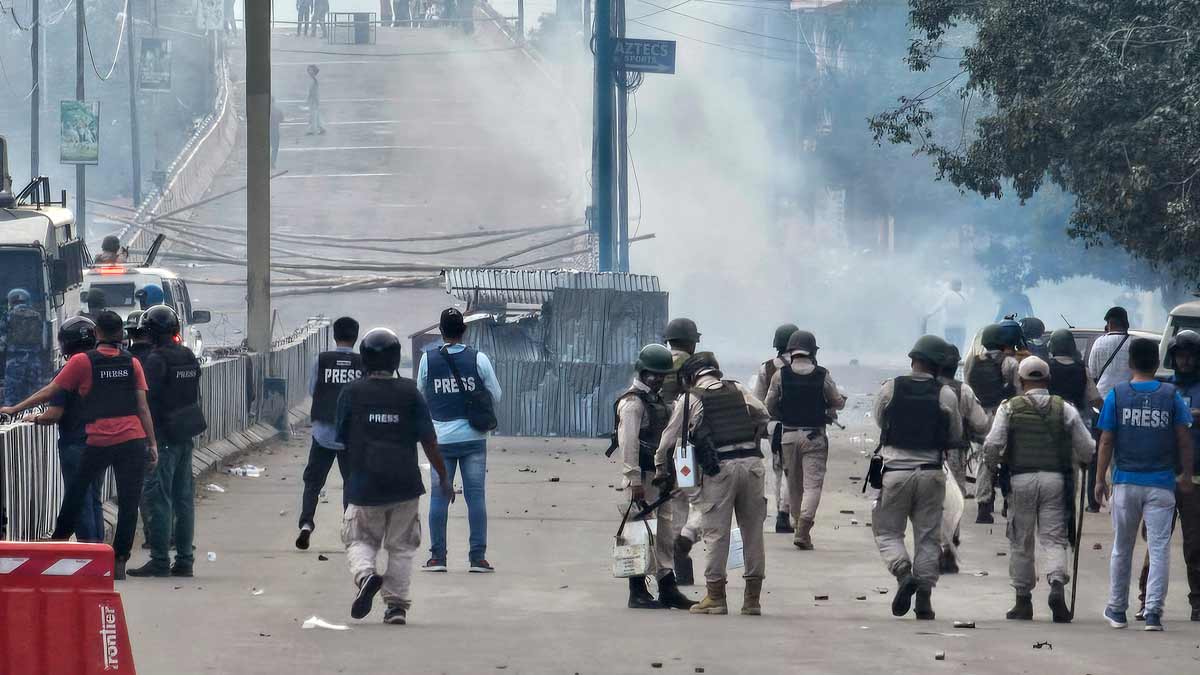 Police fire tear gas shells to disperse students protesting against a fresh wave of ethnic violence in Imphal | AP