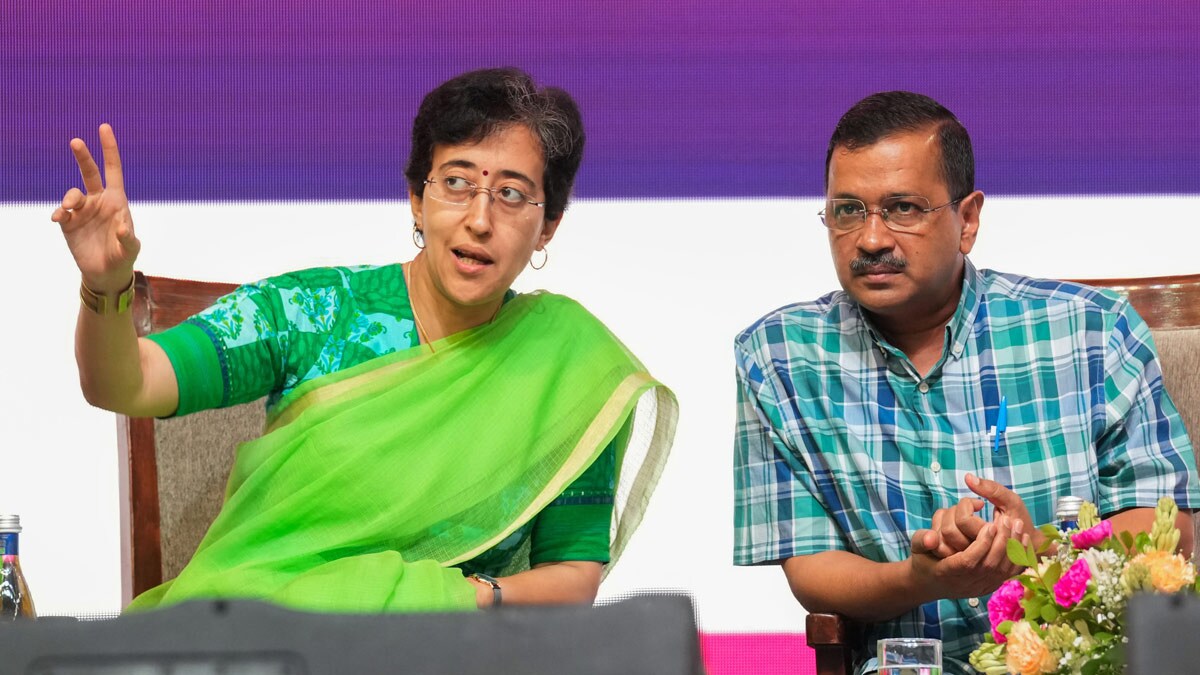 Chief Minister Arvind Kejriwal with cabinet minister Atishi | PTI
