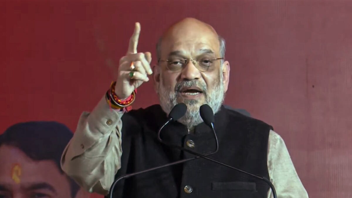 Union Home Minister and BJP leader Amit Shah speaks during a public meeting for the upcoming Delhi Assembly elections, at Narela | PTI