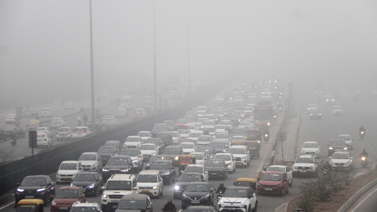 Vehicles move on the Delhi-Gurugram expressway amid low visibility on a foggy winter morning, in Gurugram | PTI 