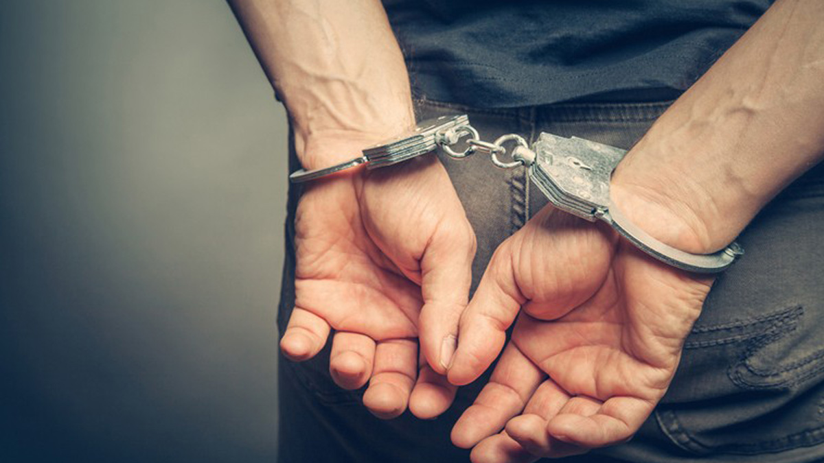 Criminal handcuff stock image