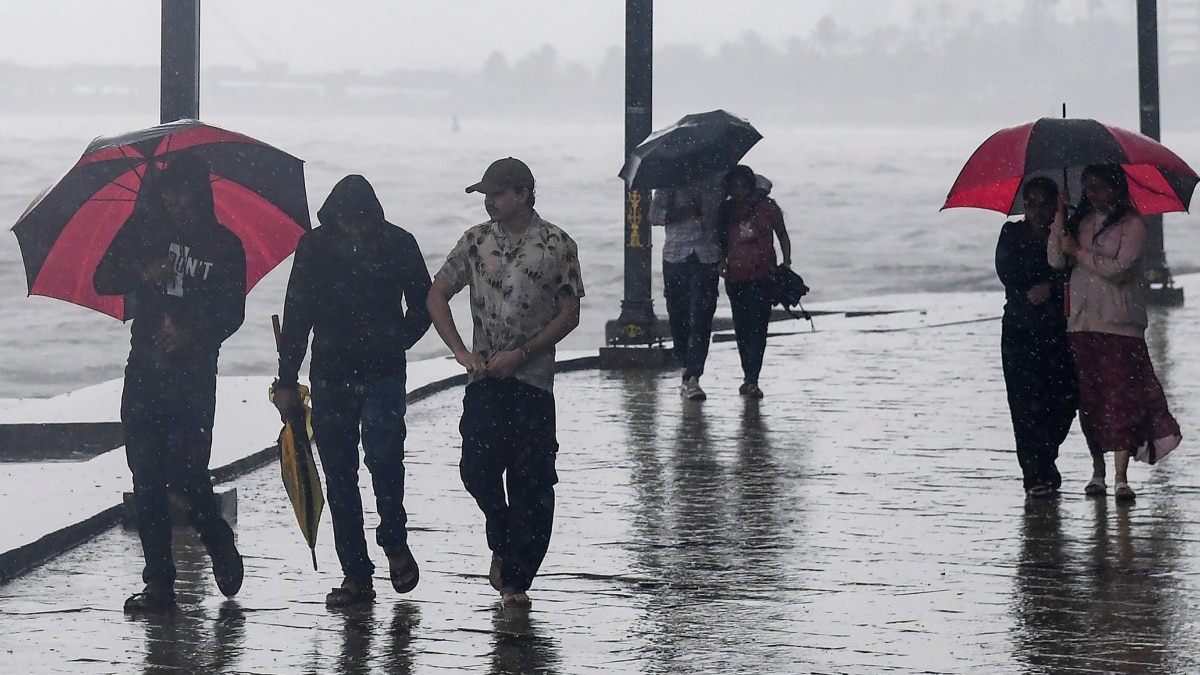 People visit Bandra Bandstand amid rain in Mumbai | PTI