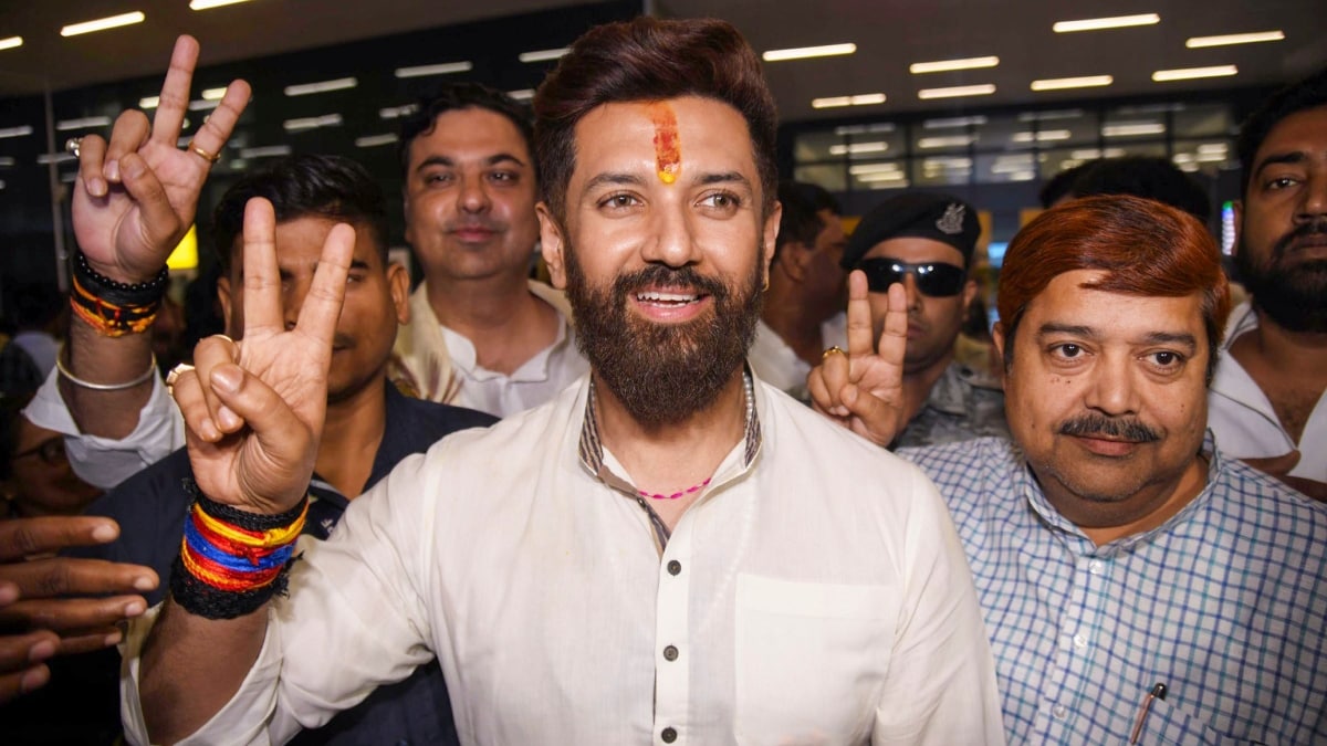 Union Minister Chirag Paswan shows a victory sign at Jay Prakash Narayan International Airport ahead of voting in the second phase of Bihar Assembly Elections | PTI