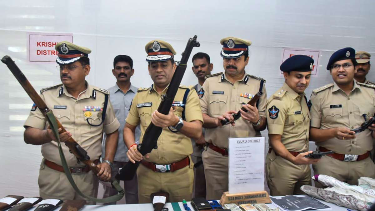 ADGP (Intelligence) Mahesh Chandra Laddha with other officials shows recovered arms and ammunitions during a press conference, in Vijayawada | PTI