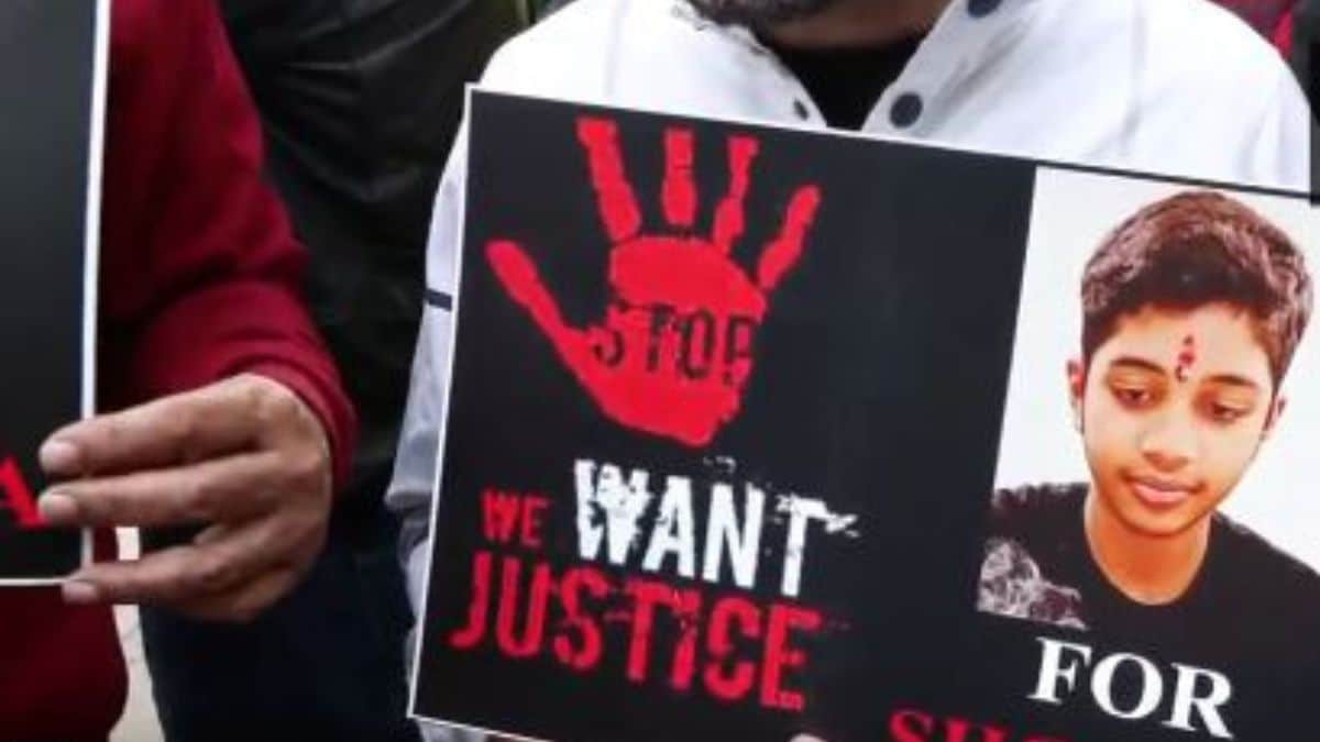 Banners put up by protesters in front of St. Columbus School, Delhi, after a class X student committed suicide | X 