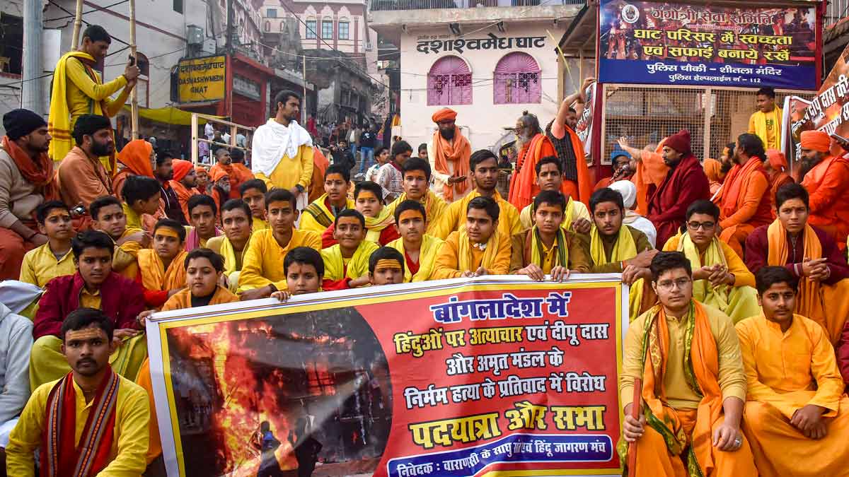 Members of Sant Samaj staging a protest in Varanasi over the alleged killing of Hindus in Bangladesh | PTI