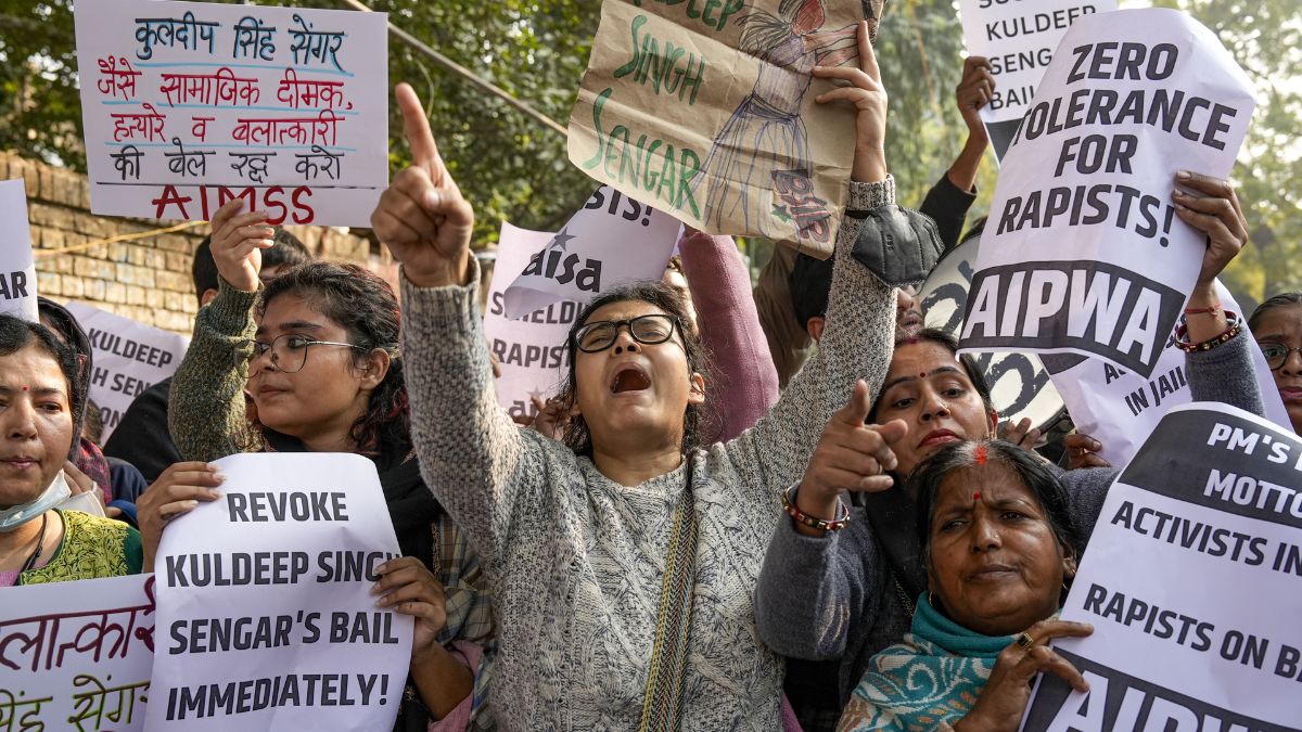 Protestors at Jantar Mantar raise slogans seeking justice for the Unnao rape case survivor in New Delhii on Dec. 28, 2025 | PTI 